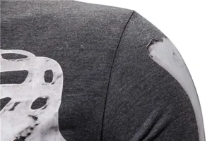 Detailed view of men's stretch long sleeve fitness shirt showing fabric texture and print.