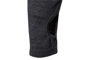 Men's athletic long sleeve shirt cuff detail, stretch dark grey fabric with thumb hole design.