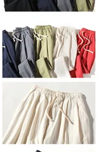 Detail view showing multiple colors and waistband texture of men's casual linen harem pants.