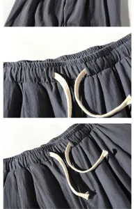 Mens casual linen pants waistband detail close-up showing elastic and drawstring.