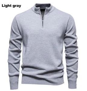 Men's light gray stand collar half-zip knit sweater, casual slim fit pull-over top.