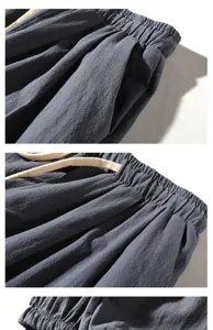 Men's casual linen pants detail shot, elastic drawstring waist, breathable summer fabric.