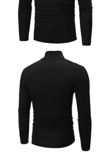 Detailed view of the black men's slim fit long sleeve turtleneck t-shirt fabric and collar.