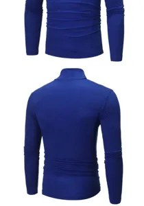 Close-up view of the solid blue turtleneck long-sleeve slim fit men's base shirt detail.