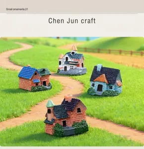 Detailed view of multiple miniature resin cottage models for micro-landscape decor