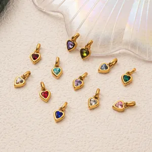 Selection of 12-month birthstone heart pendants in golden 316 stainless steel for DIY jewelry