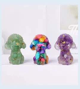 Detailed macro view of natural crystal and resin poodle figurines with gold leaf accents