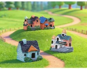 Close-up of miniature garden houses on moss lawn for micro landscape