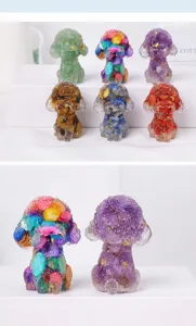 Close-up detail of handcrafted crystal gravel and resin poodle figurines with gold flakes