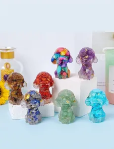 Detailed view of handmade resin poodle figurines featuring natural colorful crystal stones