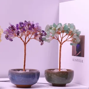Detailed view of handmade natural crystal money trees in decorative ceramic pots