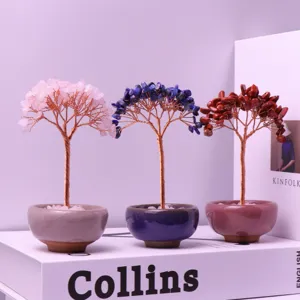 Macro detail of three natural crystal money trees in colorful ceramic teacup bases
