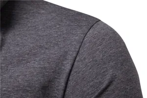 Men's dark grey stretch fabric long sleeve t-shirt shoulder and seam detail close up.