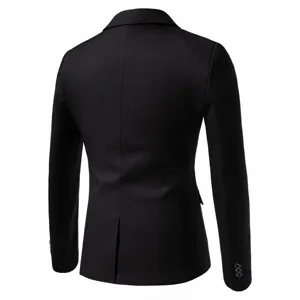 Back detail view of the black men slim fit suit jacket showing tailoring and single vent.