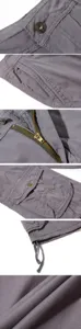 Men's casual cargo shorts detail view, featuring durable fabric, zipper, and pockets.