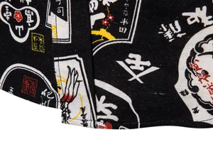 Close-up detail of men's vintage Japanese style printed linen fabric shirt showing pattern.
