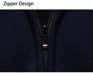 Men's knitted sweater detail view, high collar with half zipper design, dark blue fabric.