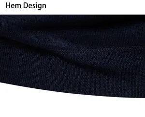 Detailed view of the dark blue knit sweater hem design, showcasing fine ribbed texture.