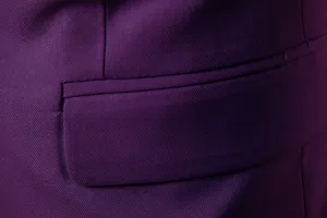 Detailed shot of purple men suit jacket fabric and pocket craftsmanship, elegant texture.