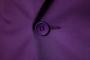 Close-up detail of purple men's suit jacket fabric and single button texture.