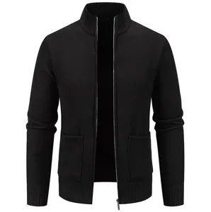 Close-up detail of black knitted cardigan zipper and pocket design for men fashion style