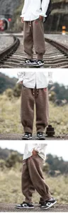 Pantalon décontracté en laine d'agneau épaisse d'hiver pour homme broderie rétro chaude.