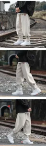 Pantalon d'hiver épais en sherpa pour homme broderie vintage détail de rue style