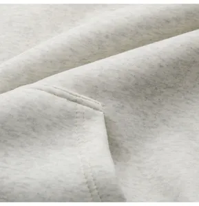 Men's casual solid color hoodie fabric detail closeup, soft cotton texture and neat stitching.