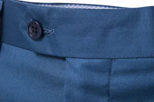 Men's business casual suit pants waistband detail, solid blue fabric with button closure.
