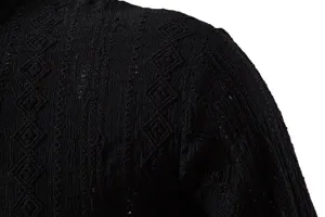 Men's black long sleeve shirt close-up, premium textured jacquard fabric detail view.