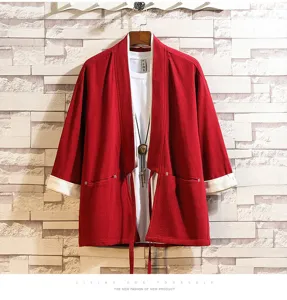 Detail view of men's Chinese style red and white contrast kimono cardigan with tee.