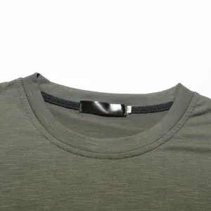 Detail view of the olive green mens crew neck short sleeve t shirt collar showing size M label.