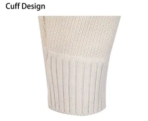 Close-up detail of the ribbed knit sweater cuff in off-white, showing texture and quality.
