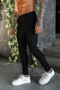 Men's black casual stretch slim trousers for spring and summer, stylish detail view.
