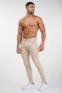 Men casual slim fit trousers detail, featuring stretch fabric and classic khaki color for wear.