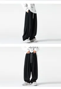 Pantalones casuales amplios de hombre vista detallada, comodo estilo streetwear retro.