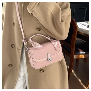 Chic pink shoulder crossbody bag for women, trendy square handbag with stylish scarf and lock.