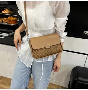 Stylish woven texture flap shoulder bag detail showcasing premium leather and hardware craft.