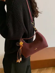 Womens stylish suede underarm shoulder bag, elegant casual commuter hobo bag with chic strap.