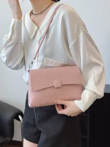 Stylish pink women's shoulder bag, chic crossbody tote for daily commute and casual wear.