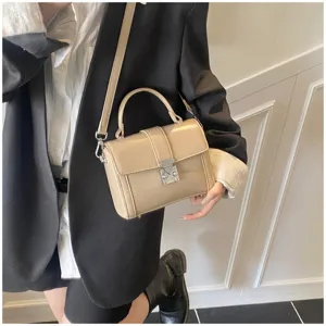 Chic khaki top-handle box bag, versatile commuter shoulder crossbody bag for daily fashion wear.