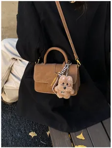 Stylish brown shoulder bag for women, trendy PU leather crossbody bag with cute plush bear.
