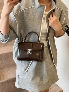 Chic brown patent top handle crossbody box bag for women, stylish minimalist commute handbag