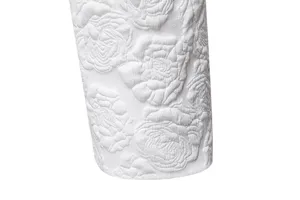 White floral jacquard fabric detail for men suit jacket sleeve texture close up view