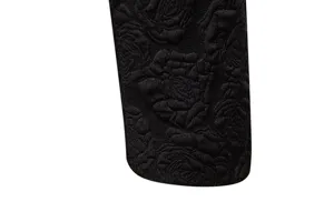 Black rose floral jacquard suit fabric detail shot showing fine texture and premium quality.