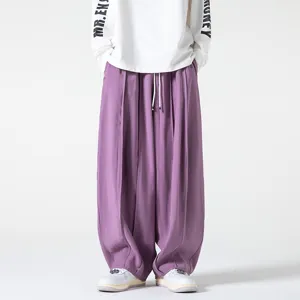 Pantalones anchos morados hombre estilo vintage japonés casual streetwear otoño moda
