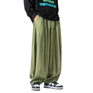 Pantalón holgado liso de pierna ancha para hombre, estilo retro japonés casual streetwear.
