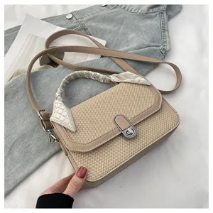 Stylish minimalist woven crossbody bag with scarf handle and metal lock for women daily use.