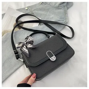 Crossbody shoulder bag for women, simple solid color handbag with stylish scarf and metallic lock.
