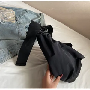 Black nylon dumpling crossbody bag large capacity lightweight casual commuter shoulder bag for women